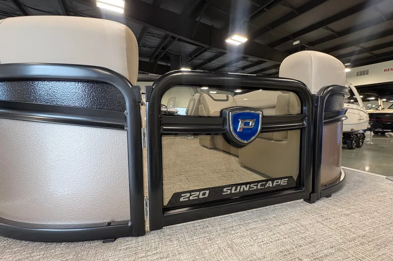 Slide: The Image of 2027 Premier 220 Sunscape RL - CL pontoon boat interior with plush seating and sleek design. - 15