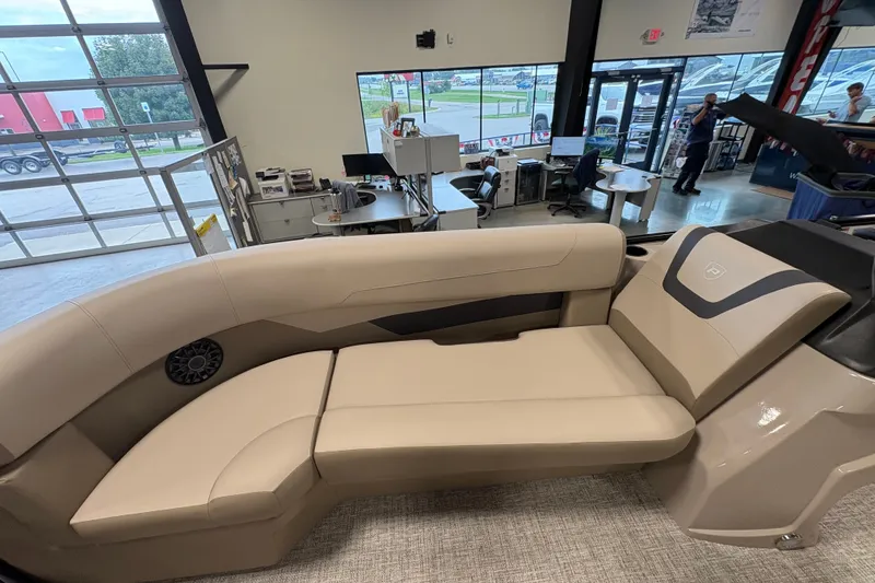 Slide: The Image of Luxurious seating inside a 2027 Premier 220 Sunscape RL - CL boat showroom. - 8