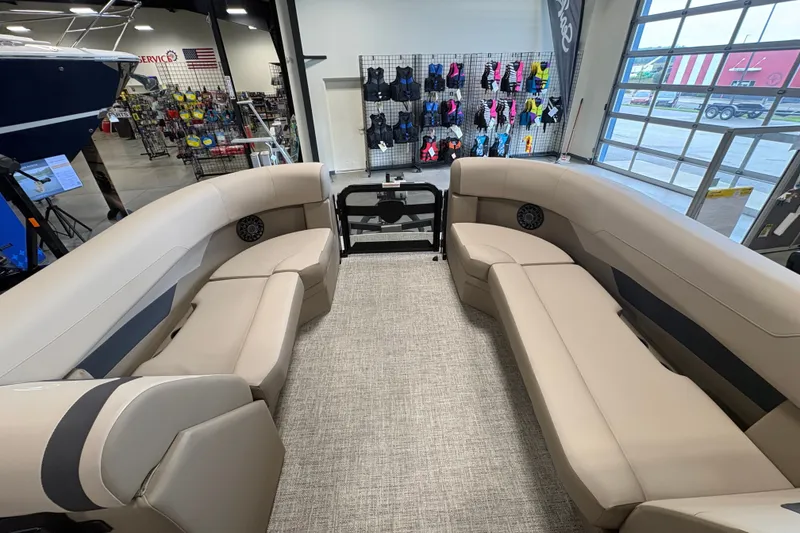 Slide: The Image of Interior of 2027 Premier 220 Sunscape RL - CL pontoon boat with beige seating. - 6