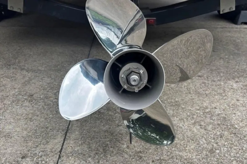 Slide: The Image of Close-up of a shiny boat propeller on a 2012 Chaparral 19 H2O Ski & Fish. - 5