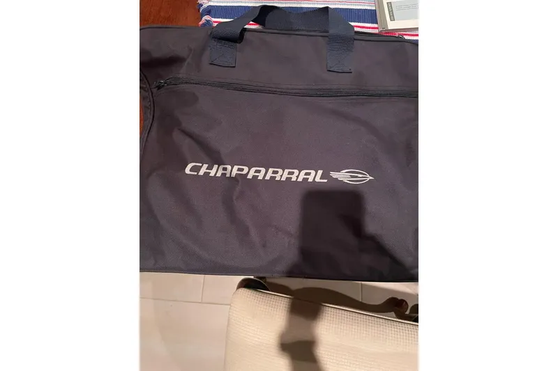 Slide: The Image of Black Chaparral bag with logo, related to 2012 Chaparral 19 H2O Ski & Fish. - 7