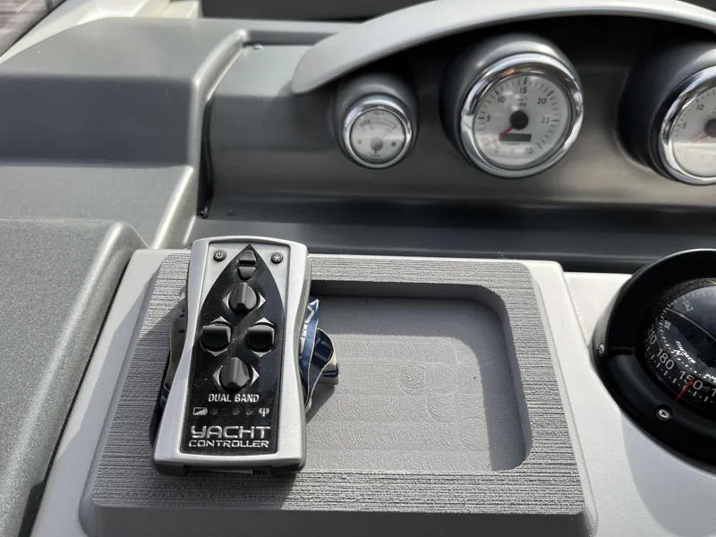 Slide: The Image of Yacht controller on 2008 Azimut 62S dashboard with gauges and compass. - 17