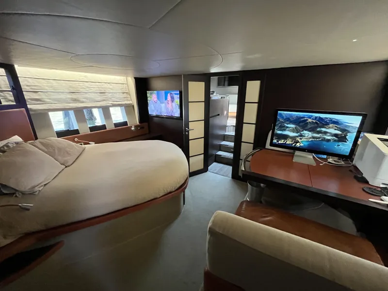 Slide: The Image of Luxurious interior of a 2008 Azimut 62S yacht with modern amenities and elegant design. - 27