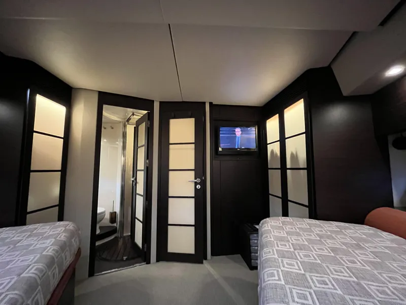 Slide: The Image of Interior of 2008 Azimut 62S yacht with modern design and twin beds. - 34