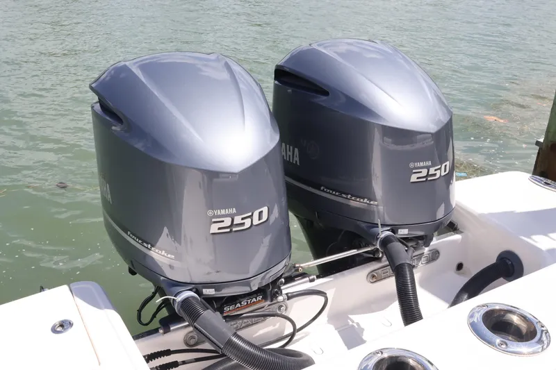 Slide: The Image of Twin Yamaha 250 outboard engines on a 2020 Robalo R272 Center Console boat. - 10