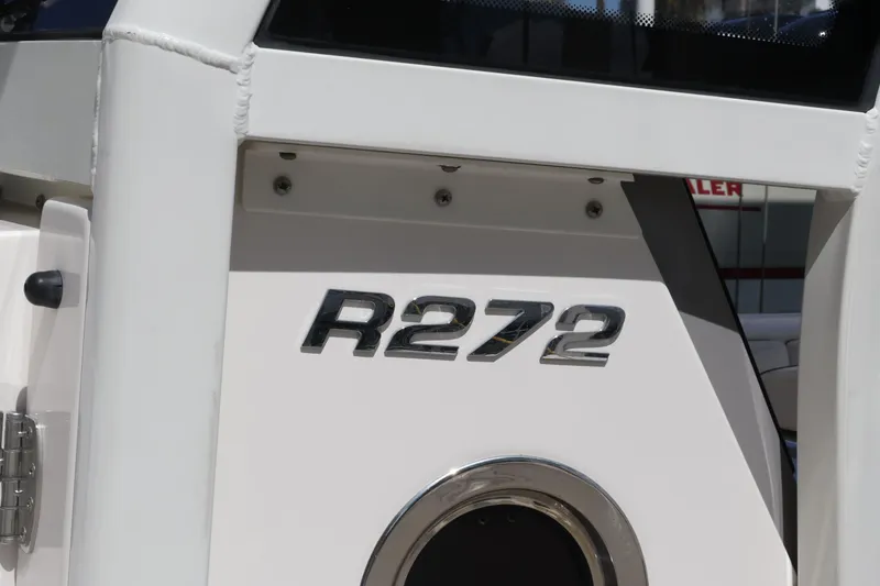 Slide: The Image of 2020 Robalo R272 Center Console boat emblem detail. - 30