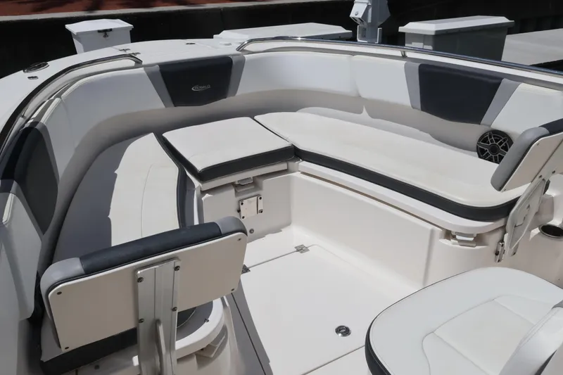 Slide: The Image of 2020 Robalo R272 Center Console boat interior with cushioned seating and modern design. - 31
