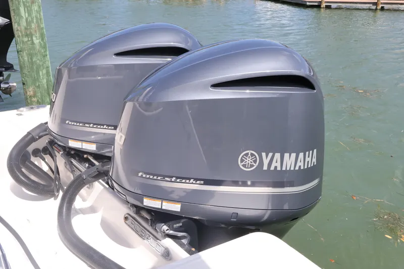 Slide: The Image of Twin Yamaha four-stroke engines on a 2020 Robalo R272 Center Console boat. - 9
