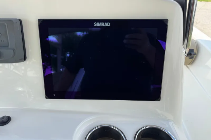 Slide: The Image of Simrad display on 2020 NauticStar 231 Hybrid boat dashboard. - 21
