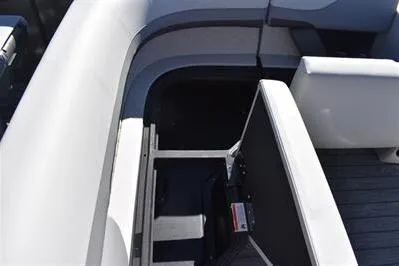 Slide: The Image of 2026 Lowe SF 232 Sport Fish boat interior seating and storage compartment. - 21