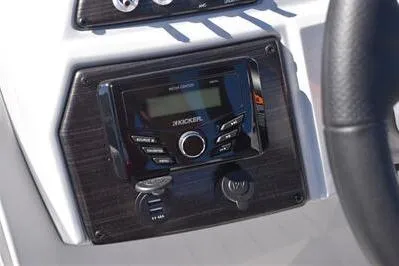 Slide: The Image of 2026 Lowe SF 232 Sport Fish boat dashboard with Kicker stereo system. - 28