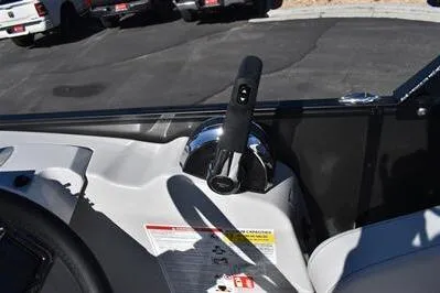 Slide: The Image of 2026 Lowe SF 232 Sport Fish boat throttle control in cockpit. - 33
