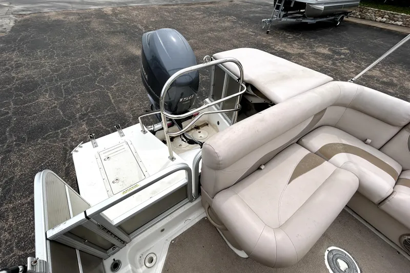 Slide: The Image of 2014 Hurricane FunDeck 226F boat with Yamaha 150 engine and spacious seating. - 20