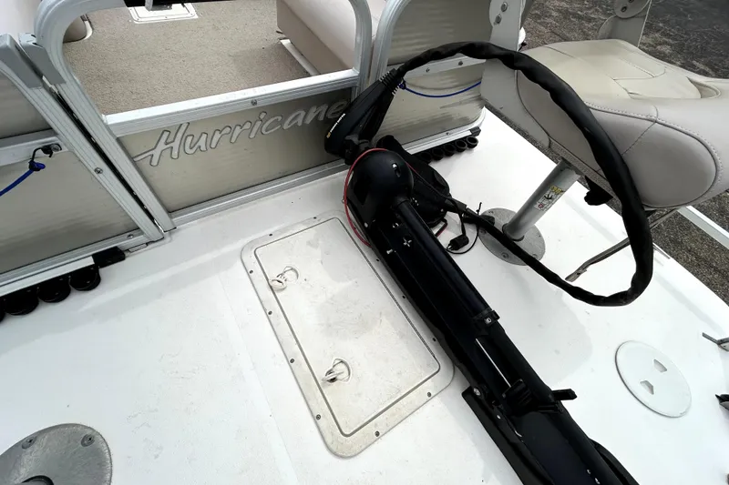 Slide: The Image of 2014 Hurricane FunDeck 226F boat interior with seating and equipment. - 31