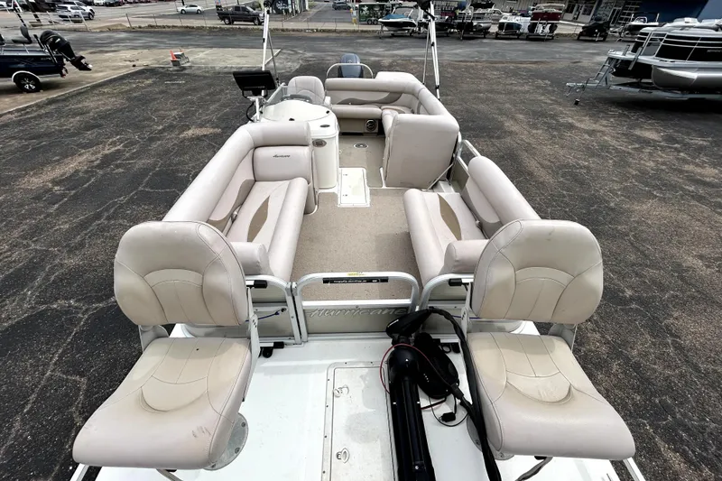 Slide: The Image of 2014 Hurricane FunDeck 226F boat with spacious seating and modern design. - 8