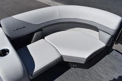 Slide: The Image of 2026 Lowe SF 212 Sport Fish boat seating with gray upholstery and cup holder. - 17