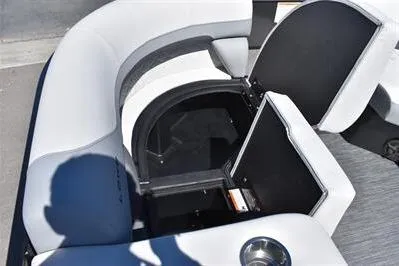 Slide: The Image of 2026 Lowe SF 212 Sport Fish boat with open storage compartment and seating area. - 18