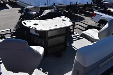 Slide: The Image of 2026 Lowe SF 212 Sport Fish pontoon boat interior with seating and storage. - 22