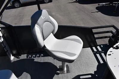 Slide: The Image of 2026 Lowe SF 212 Sport Fish boat seat, gray and white design, outdoor setting. - 24