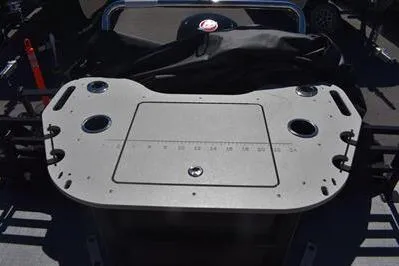 Slide: The Image of 2026 Lowe SF 212 Sport Fish boat console with cup holders and storage compartment. - 25