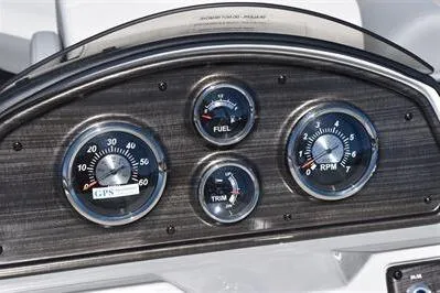 Slide: The Image of Dashboard of 2026 Lowe SF 212 Sport Fish boat with gauges for speed, fuel, trim, and RPM. - 31