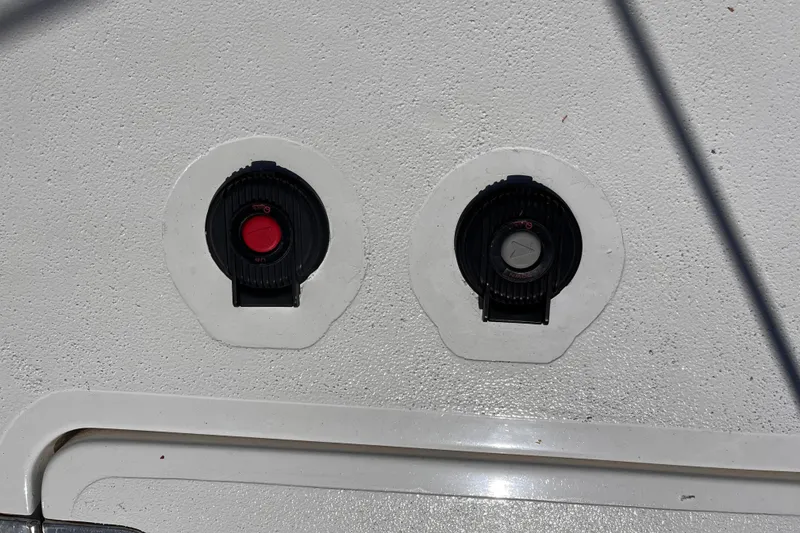 Slide: The Image of Two fuel caps on a 2008 Broadblue 415 catamaran. - 10