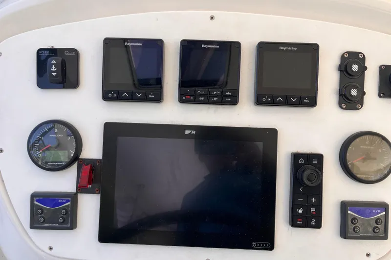 Slide: The Image of Control panel of a 2008 Broadblue 415 catamaran with navigation instruments. - 15