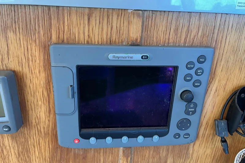 Slide: The Image of Raymarine E80 navigation system on 2008 Broadblue 415 yacht, mounted on wooden panel. - 28