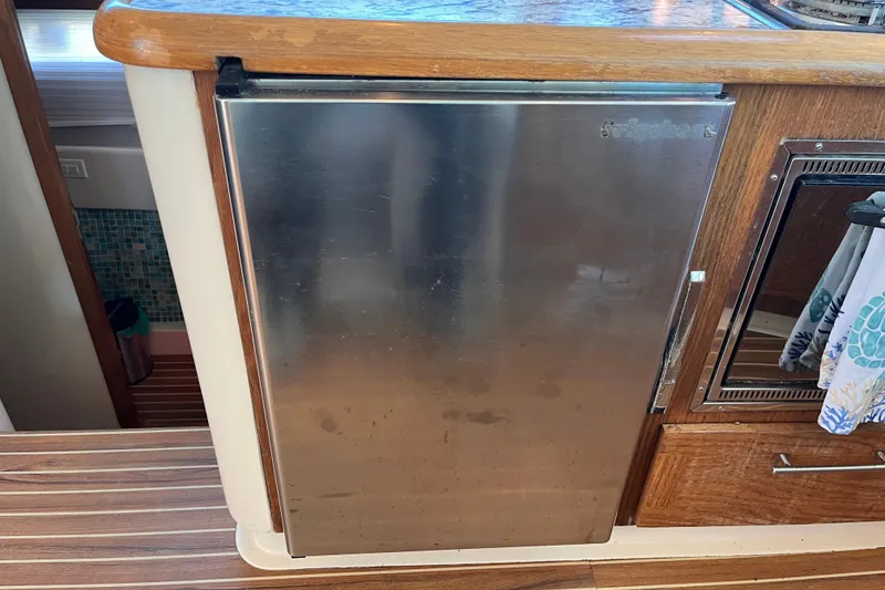Slide: The Image of Stainless steel refrigerator in a 2008 Broadblue 415 yacht kitchen. - 30