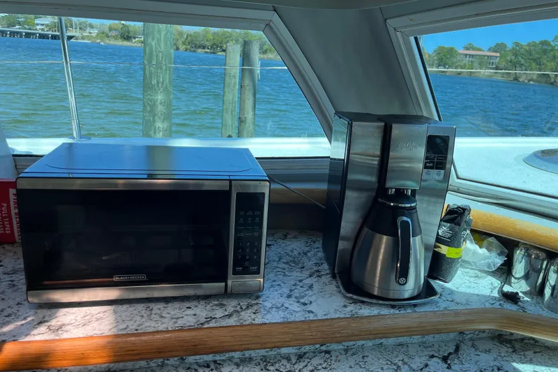Slide: The Image of Microwave and coffee maker on Broadblue 415 yacht, 2008, with scenic water view. - 34
