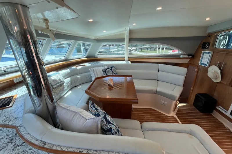 Slide: The Image of Luxurious interior of 2008 Broadblue 415 catamaran with elegant seating and wooden table. - 36