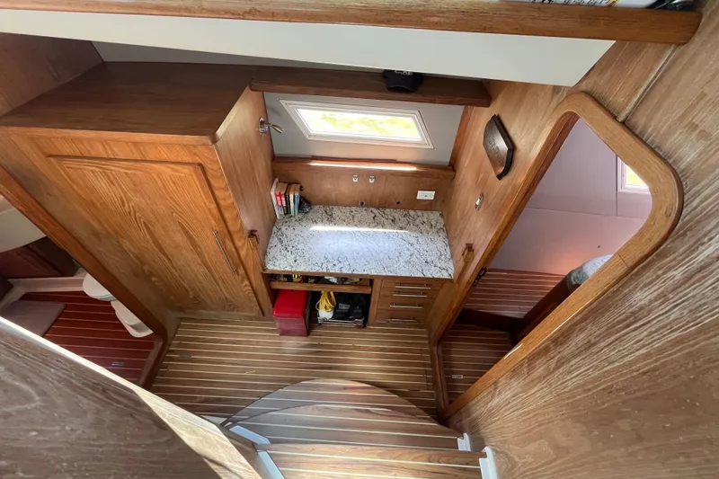 Slide: The Image of Interior of 2008 Broadblue 415 yacht with wooden cabinetry and granite countertop. - 46