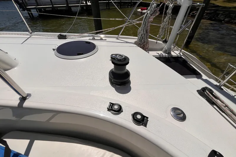Slide: The Image of Deck of 2008 Broadblue 415 catamaran with winch and ropes in marina setting. - 58