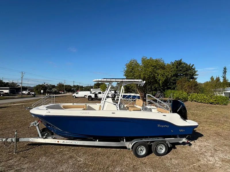 The Image of 2025 Trophy T24 CC boat on trailer outdoors. - 1