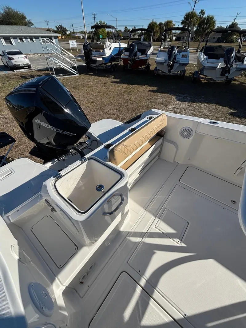 Slide: The Image of Interior of a 2025 Trophy T24 CC boat with Mercury engine. - 12