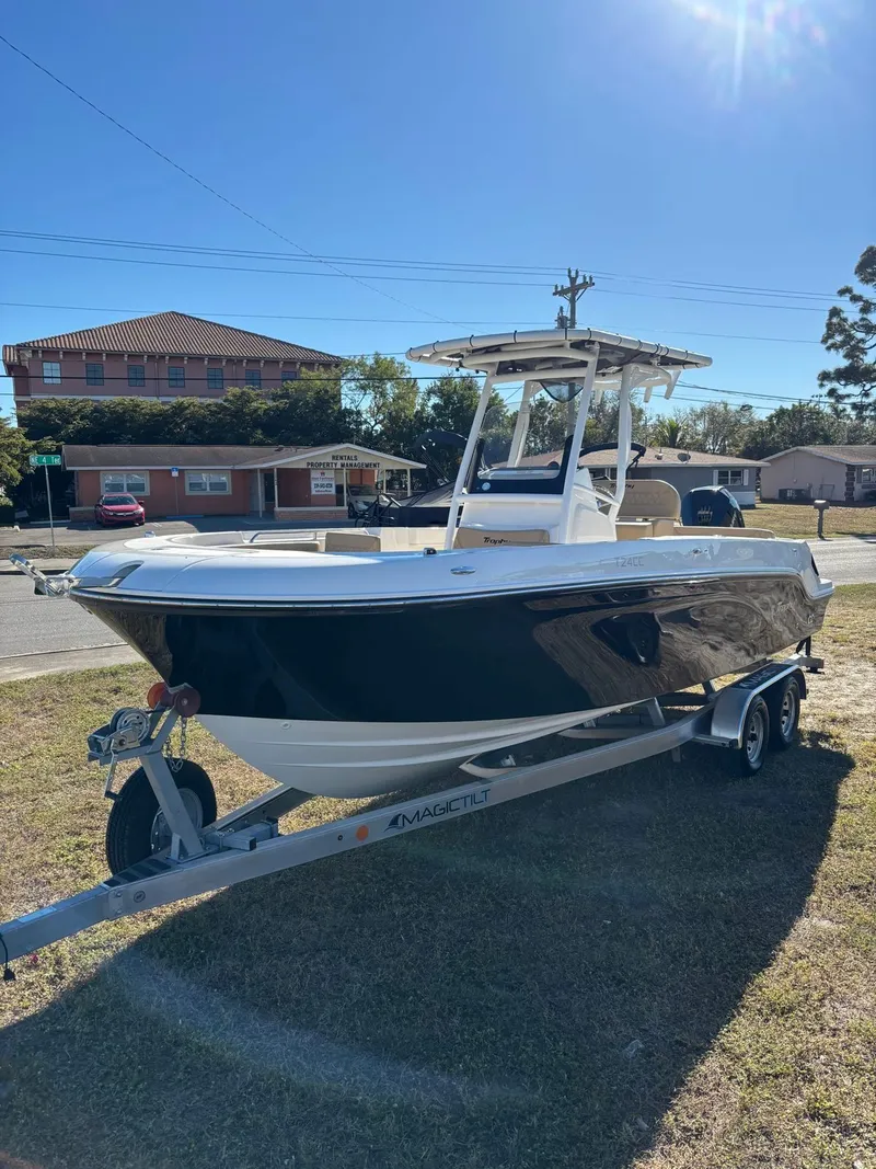 The Image of 2025 Trophy T24 CC boat on trailer outdoors. - 1
