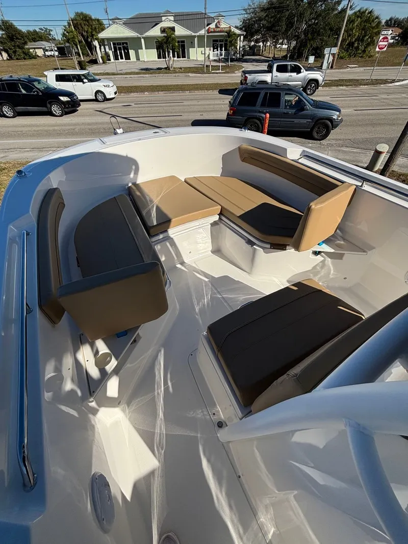 Slide: The Image of Interior view of 2025 Trophy T24 CC boat with seating area. - 3