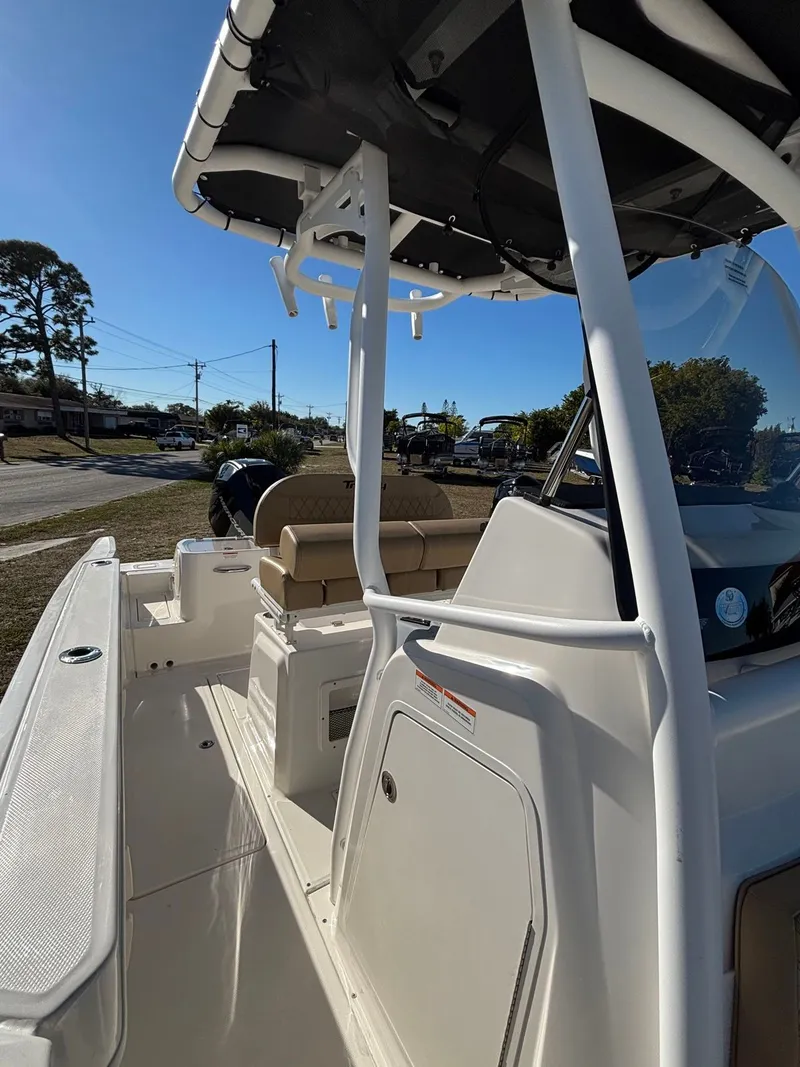 Slide: The Image of Interior view of 2025 Trophy T24 CC boat with seating area. - 7