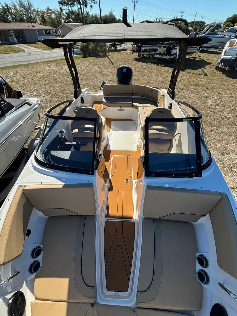 Slide: The Image of 2025 Bayliner V20 boat with open deck and seating area. - 10