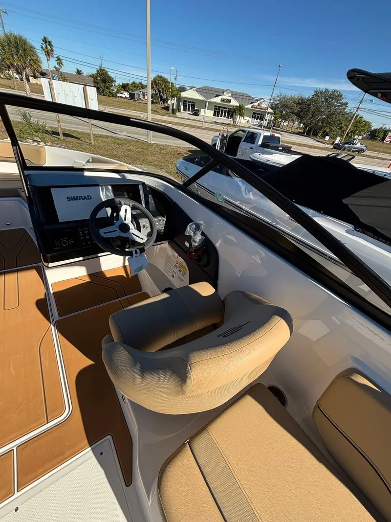 Slide: The Image of Interior of 2025 Bayliner V20 with helm console and leather seats. - 4