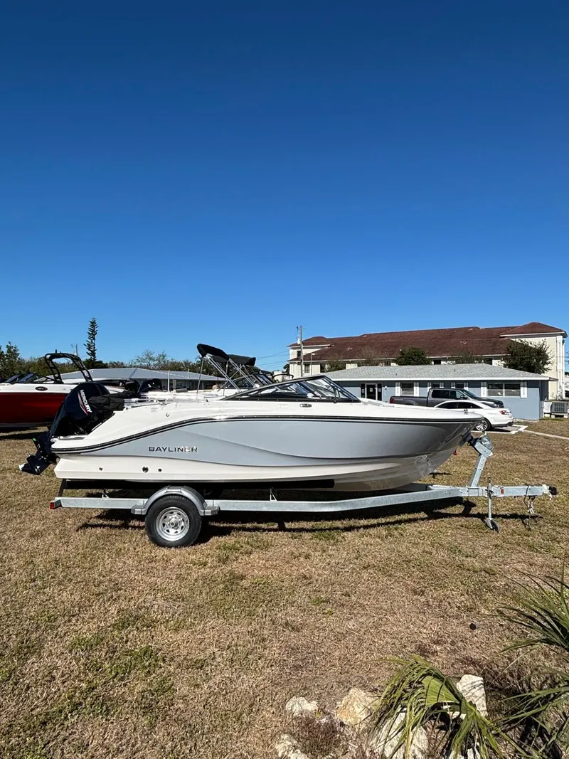 The Image of 2026 Bayliner V20 boat on trailer outdoors. - 1