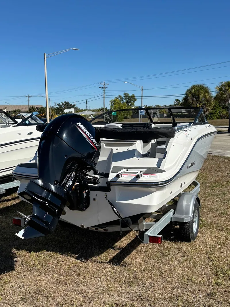 Slide: The Image of 2026 Bayliner V20 boat with Mercury outboard motor on trailer. - 10