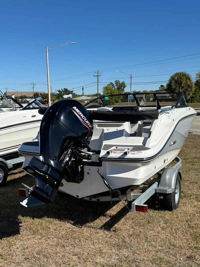 Slide: The Image of 2026 Bayliner V20 boat with Mercury outboard motor. - 2