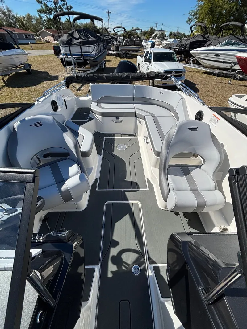 Slide: The Image of Interior view of 2026 Bayliner V20 boat with gray seating. - 7