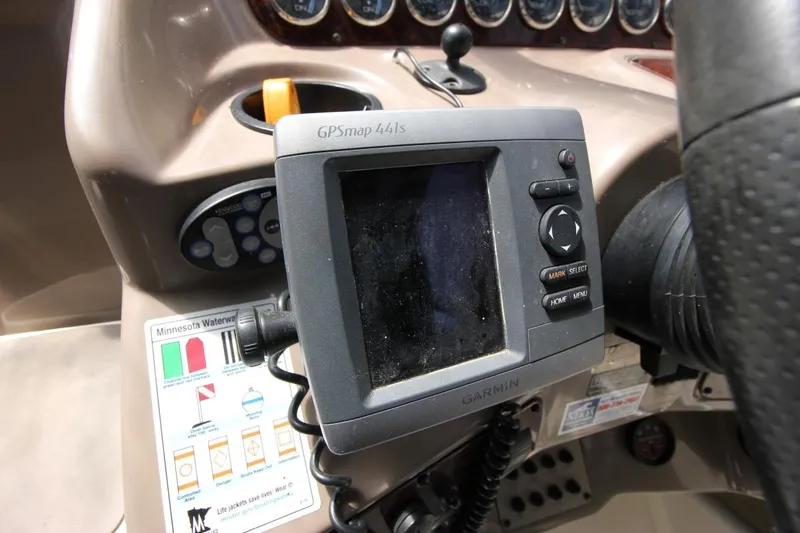 Slide: The Image of Garmin GPSmap 441s on 2002 Regal Commodore 2860 boat dashboard. - 16