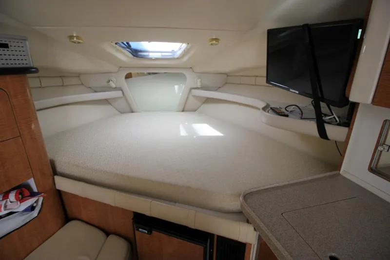 Slide: The Image of Interior cabin of 2002 Regal Commodore 2860 with bed and TV. - 20