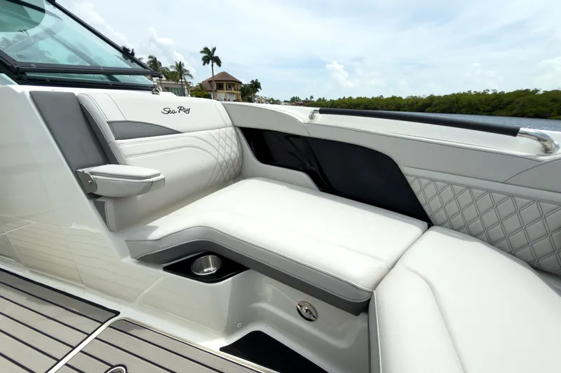 Slide: The Image of Luxurious seating area on a Sea Ray SLX 280 Outboard, featuring elegant upholstery and modern design. - 20