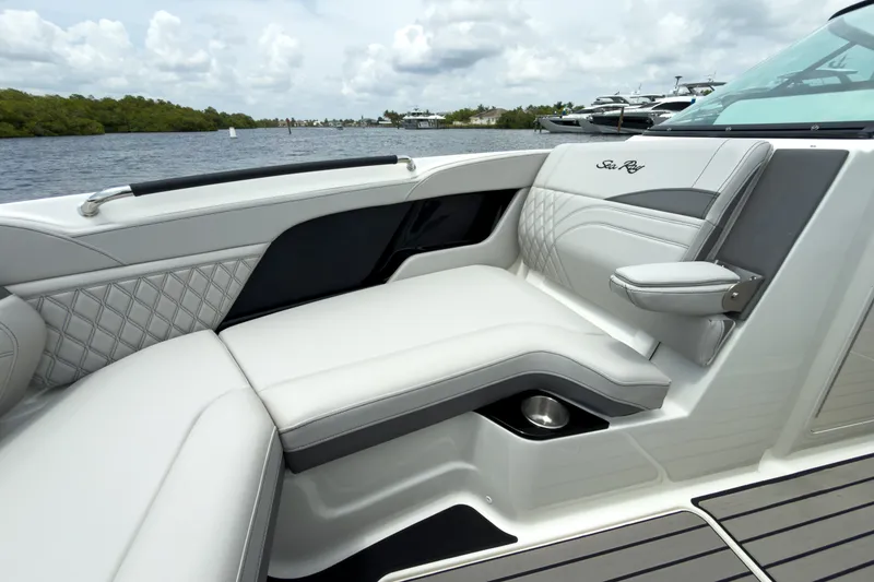 Slide: The Image of The 2027 Sea Ray SLX 280 Outboard features luxurious, cushioned seating with elegant stitching. - 21