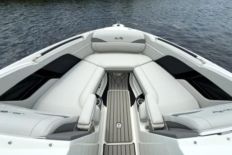 Slide: The Image of The image shows the luxurious bow design of the Sea Ray SLX 280 Outboard with sleek upholstery. - 19