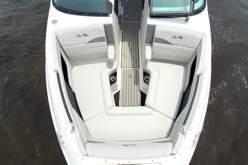 Slide: The Image of The image shows the bow of a 2027 Sea Ray SLX 280 Outboard with luxurious white seating. - 22